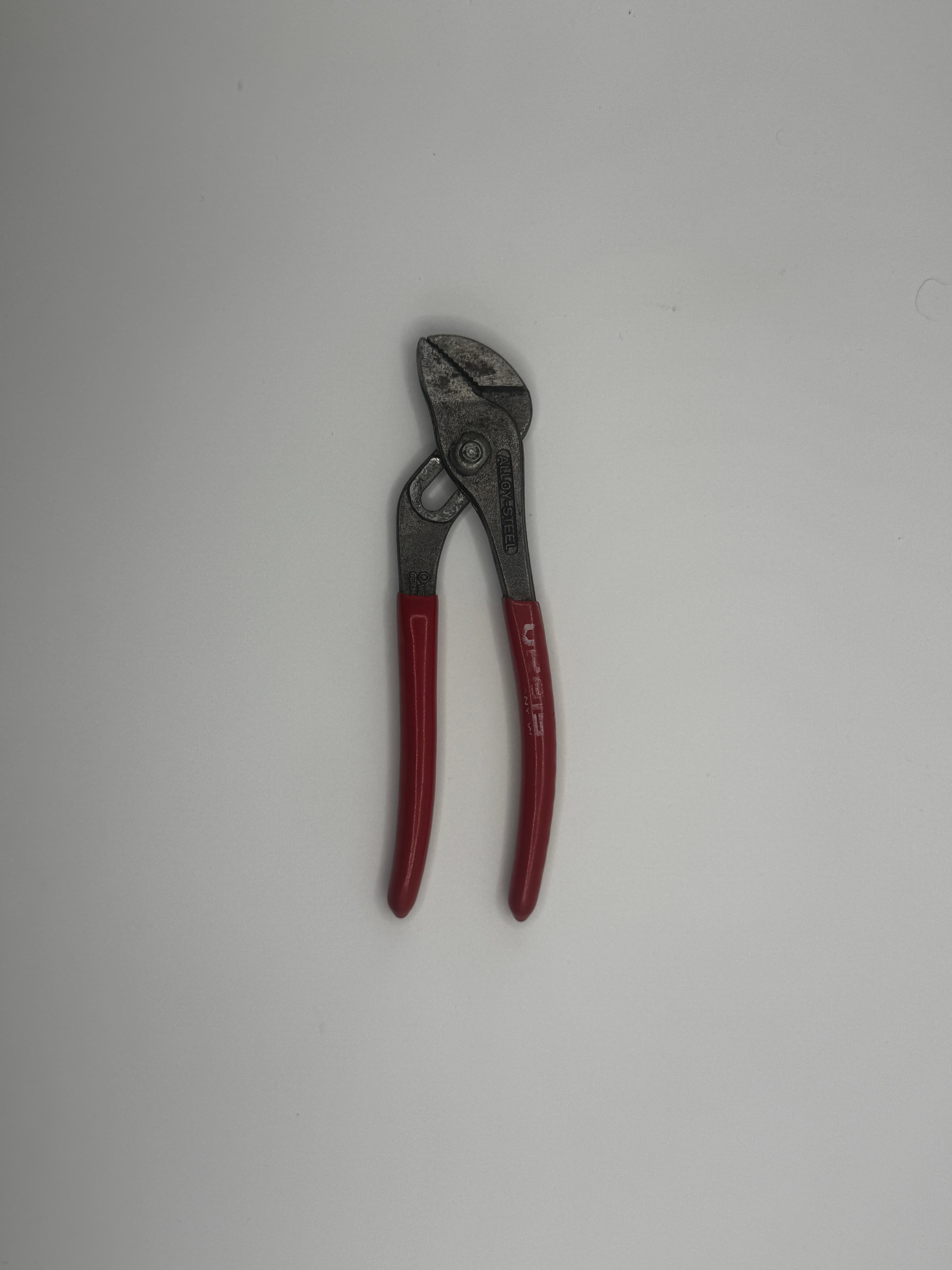Orbis tongue pliers